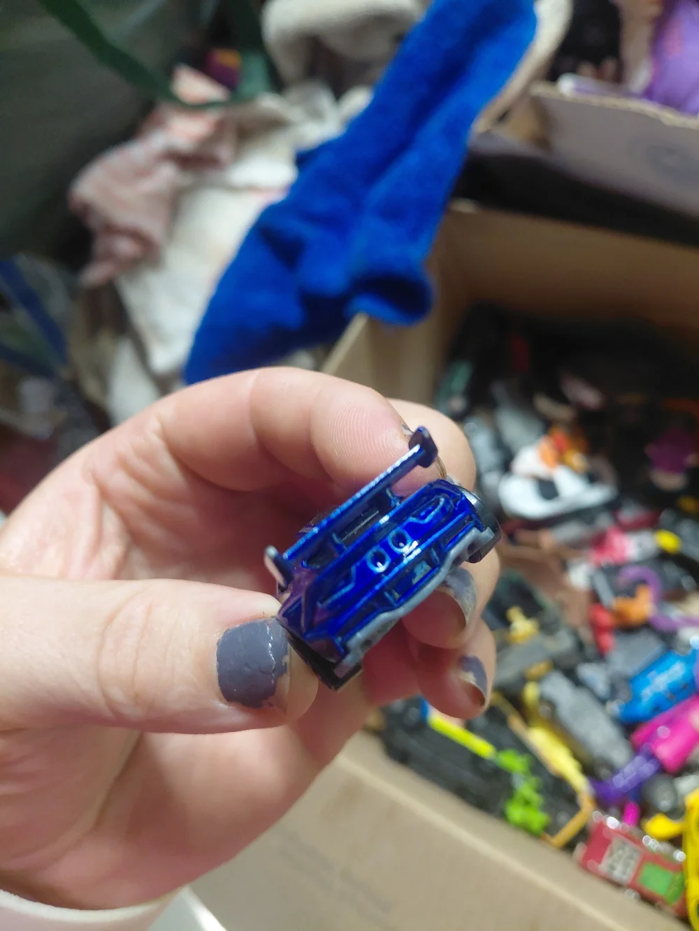 1:64 scale Hot Wheels Track Ripper in metallic blue
